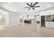 Spacious kitchen with a large island, modern appliances, and white cabinetry at 133 S Buteo Woods Ln, Las Vegas, NV 89144