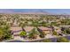 A lovely view of a well-kept neighborhood and desert mountains in the distance at 133 S Buteo Woods Ln, Las Vegas, NV 89144