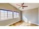 Bright bedroom with wood-look flooring and vaulted ceiling at 1532 Ascension Cir, North Las Vegas, NV 89031