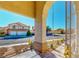 View from the front porch featuring desert landscaping, a fire hydrant and neighboring houses at 1532 Ascension Cir, North Las Vegas, NV 89031