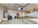 Functional garage with utilities, including a water heater, water filtration system, and extra storage space at 1532 Ascension Cir, North Las Vegas, NV 89031