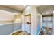Upstairs laundry room with washer and dryer, plus storage cabinets and drawers at 1532 Ascension Cir, North Las Vegas, NV 89031