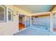 Covered patio featuring tile flooring with sliding glass doors providing access to the home's interior at 1532 Ascension Cir, North Las Vegas, NV 89031