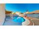 Backyard swimming pool with concrete and desert landscaping at 1532 Ascension Cir, North Las Vegas, NV 89031