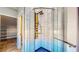 Close-up of modern shower with glass door and black hardware at 1532 Ascension Cir, North Las Vegas, NV 89031