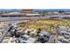 Aerial view of modern homes near a park and highway, showcasing the community's location and amenities at 1536 Unison Way # 102, Las Vegas, NV 89135