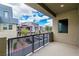 Outdoor balcony area offering views of the surrounding community and clear blue skies at 1536 Unison Way # 102, Las Vegas, NV 89135