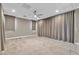 Expansive bedroom with neutral walls, carpet, and window coverings at 1536 Unison Way # 102, Las Vegas, NV 89135