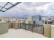 Spacious rooftop deck with views of the surrounding neighborhood and mountains at 1536 Unison Way # 102, Las Vegas, NV 89135