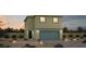 Charming two-story home with a desert landscaped front yard and an attached two-car garage at 1644 Square Fields St, Las Vegas, NV 89115