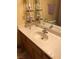 Bathroom featuring single sink vanity, mirror and open shelving at 1800 Edmond St # 213, Las Vegas, NV 89146