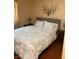 Comfortable bedroom with plush bedding and decorative wall decor at 1800 Edmond St # 213, Las Vegas, NV 89146