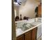 Kitchen sink with bright countertops and a breakfast bar that opens into a dining area at 1800 Edmond St # 213, Las Vegas, NV 89146