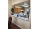 The kitchen features a breakfast bar and is equipped with modern appliances at 1800 Edmond St # 213, Las Vegas, NV 89146