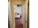 Inviting living room view with a neutral colored couch and open doorway at 1800 Edmond St # 213, Las Vegas, NV 89146