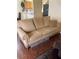 Cozy living room with hardwood flooring, complemented by a comfortable sofa with throw pillows at 1800 Edmond St # 213, Las Vegas, NV 89146