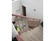 Small outdoor area visible from the stairs. Features patio decor and a door at 1800 Edmond St # 213, Las Vegas, NV 89146