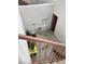 Enclosed patio space, featuring a small table and hanging rack at 1800 Edmond St # 213, Las Vegas, NV 89146