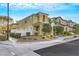 Corner lot featuring lush landscaping, sidewalk access, and a charming, well-maintained facade at 2020 Self Portrait St, Henderson, NV 89044