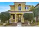 Charming two-story house with a well-kept yard, sidewalk, and a welcoming entrance at 2020 Self Portrait St, Henderson, NV 89044