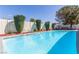 Relaxing backyard featuring a sparkling swimming pool and private landscaping for a tranquil setting at 2254 Florence Ave, Las Vegas, NV 89119