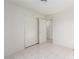 Bedroom with tile flooring, closet and entry to bathroom at 2254 Florence Ave, Las Vegas, NV 89119