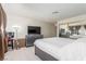 Bedroom featuring bed, dresser, tv, and matching tile flooring at 2254 Florence Ave, Las Vegas, NV 89119