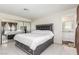 Bedroom features bed, mirrored closet and entry to bathroom at 2254 Florence Ave, Las Vegas, NV 89119