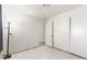 Bedroom featuring matching tile flooring, closet and entry to bathroom at 2254 Florence Ave, Las Vegas, NV 89119