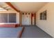 Covered entryway featuring double doors, adding a welcoming and secure entrance to the home at 2254 Florence Ave, Las Vegas, NV 89119