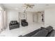 Open living room featuring tile flooring, neutral walls, and comfortable seating at 2254 Florence Ave, Las Vegas, NV 89119