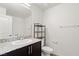 Bathroom featuring granite vanity and plenty of storage at 2677 Saddle Bronze Ct, North Las Vegas, NV 89086