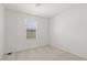 Minimal bedroom featuring neutral carpet and window at 2677 Saddle Bronze Ct, North Las Vegas, NV 89086