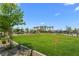 Picturesque community park showcasing a grassy area and trees at 2677 Saddle Bronze Ct, North Las Vegas, NV 89086