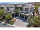 Expansive aerial view of a modern home featuring well-manicured landscaping at 29 Owl Ridge Ct, Las Vegas, NV 89135