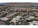 Aerial view of a neighborhood with a home outlined, showcasing its location, roof, and surrounding landscaping at 29 Owl Ridge Ct, Las Vegas, NV 89135