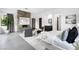Main bedroom with fireplace, seating area, and ensuite bathroom at 29 Owl Ridge Ct, Las Vegas, NV 89135
