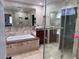 Luxurious bathroom with soaking tub, vessel sink, and glass-enclosed shower at 2913 Domino Way, Las Vegas, NV 89117