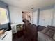 Versatile bonus room with a desk, sofa, and access to the main bedroom at 2913 Domino Way, Las Vegas, NV 89117