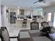 Open kitchen with island seating flows into the dining area, ideal for entertaining at 2913 Domino Way, Las Vegas, NV 89117