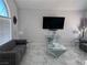 Modern living room with a large TV and elegant decor, ideal for relaxation at 2913 Domino Way, Las Vegas, NV 89117