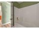 The bathroom includes a standard white tiled shower-tub combination, ideal for bathing at 3071 Misty Moon Ave, Henderson, NV 89052