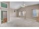 Large bedroom with vaulted ceiling, ceiling fan, and plenty of natural light from the windows at 3071 Misty Moon Ave, Henderson, NV 89052