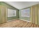 Bright bedroom with wood floors, natural light, and a calming ambiance at 3071 Misty Moon Ave, Henderson, NV 89052