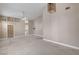 Open bedroom featuring high ceilings and a view to a connected bathroom and walk-in closet at 3071 Misty Moon Ave, Henderson, NV 89052
