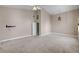 Spacious bedroom with high ceilings, neutral walls, and a unique hanging decoration at 3071 Misty Moon Ave, Henderson, NV 89052