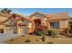 Inviting single-story home boasting a three-car garage and beautifully maintained landscaping at 3071 Misty Moon Ave, Henderson, NV 89052