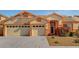 Charming single-story home with a three-car garage, tidy landscaping, and a warm, inviting entrance at 3071 Misty Moon Ave, Henderson, NV 89052