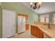 Well-lit kitchen featuring ample counter space, wood cabinets, and standard appliances, perfect for meal preparation at 3071 Misty Moon Ave, Henderson, NV 89052