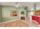 Spacious living room boasts a fireplace, breakfast bar, and ample lighting at 3071 Misty Moon Ave, Henderson, NV 89052